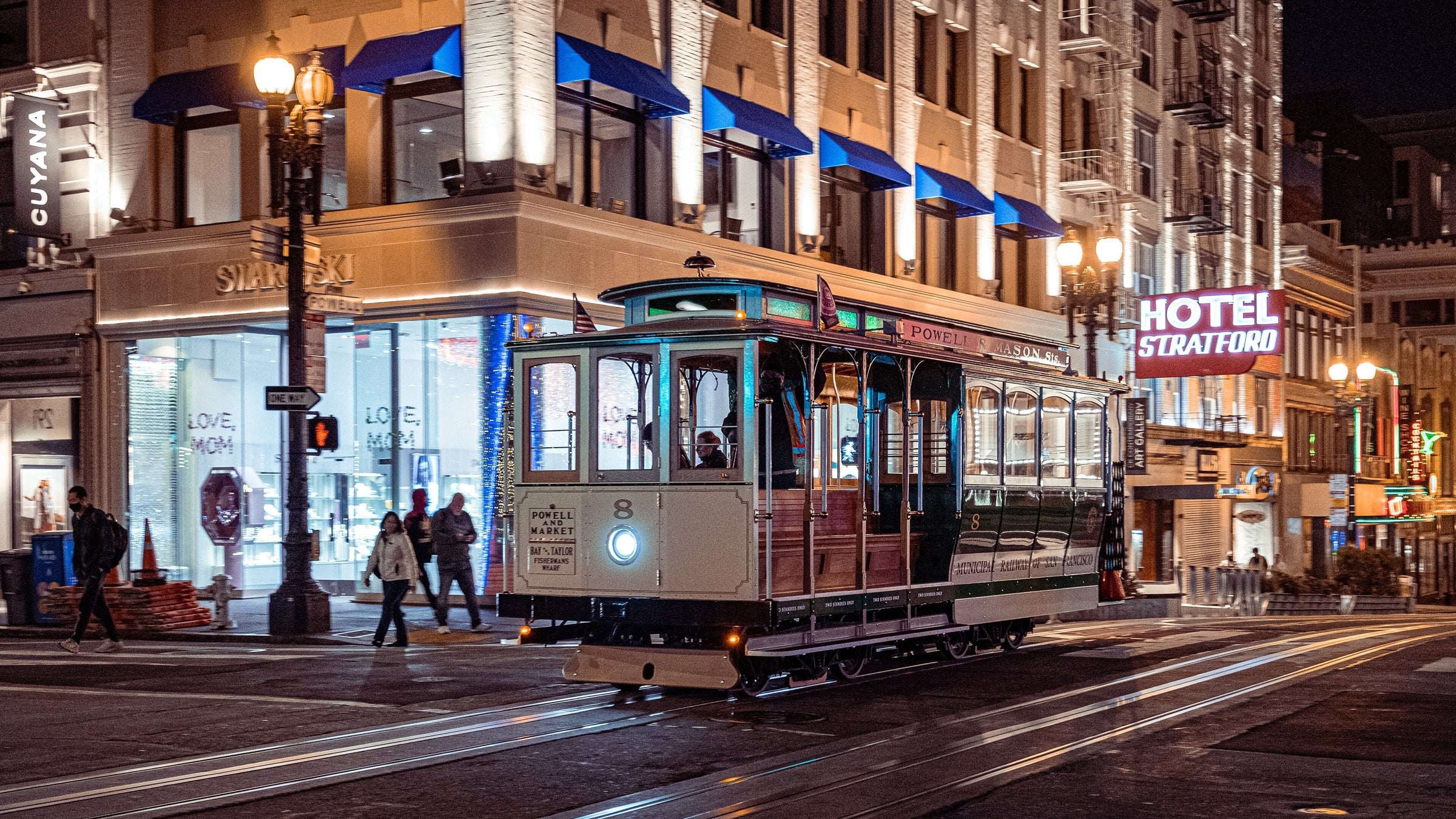 Cable car on Powell Street at Union Square, Hotel Stratford sign